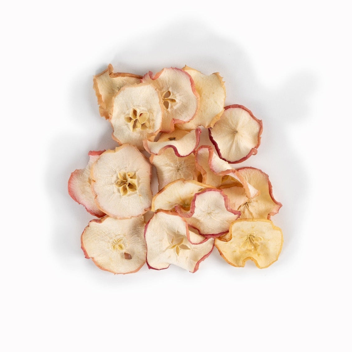 Dehydrated apple slices used as fruit garnishes for cocktails and beverages