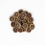 Dehydrated lime slices arranged on white background