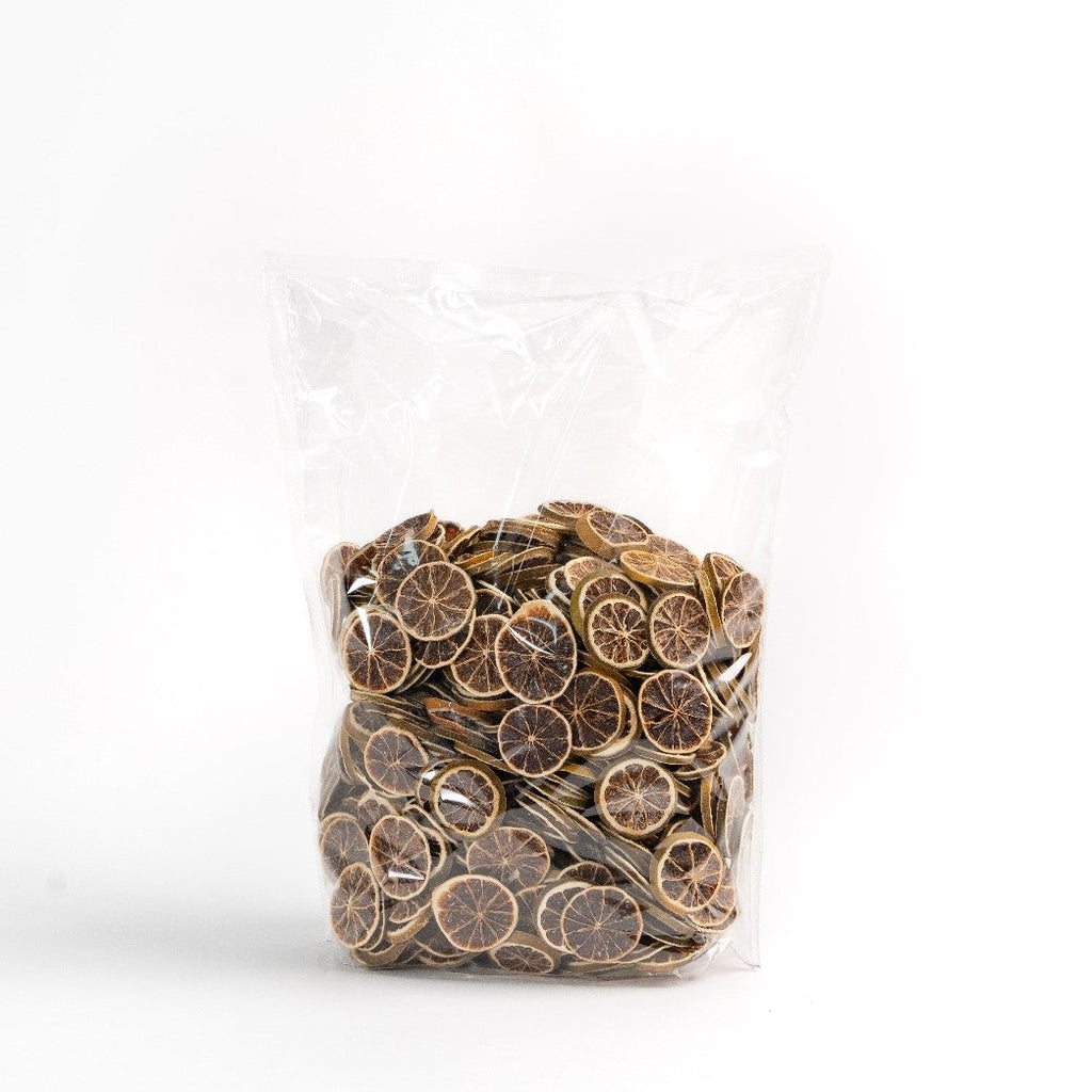 Dried lime wheels for cocktail and beverage garnish