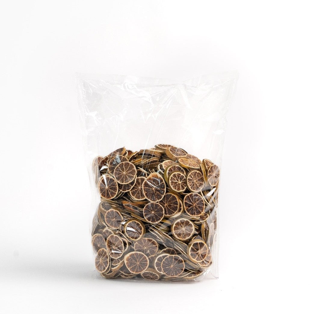 Dried lime wheels for cocktail and beverage garnish