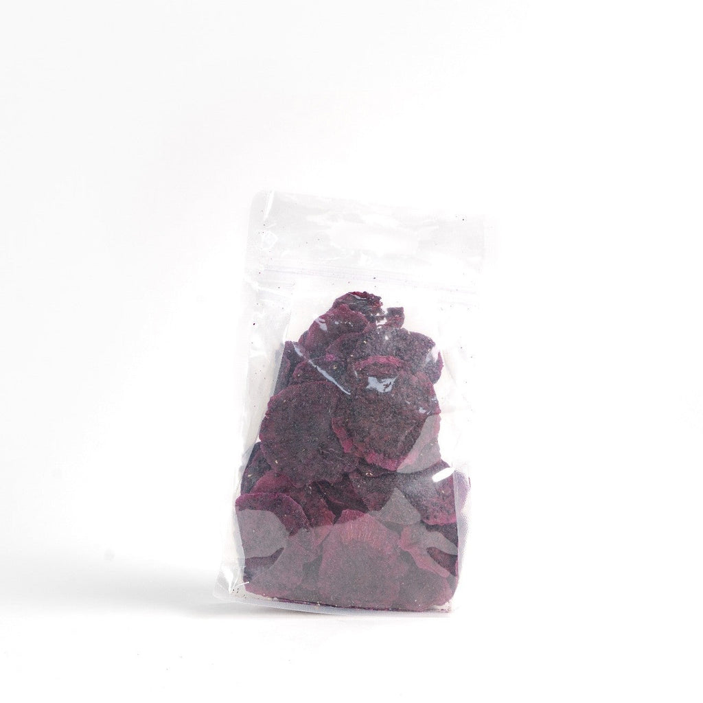Dried red dragon fruit garnish in a bag