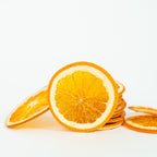 Dehydrated orange slices on white background, premium cocktail garnish for drinks and mocktails