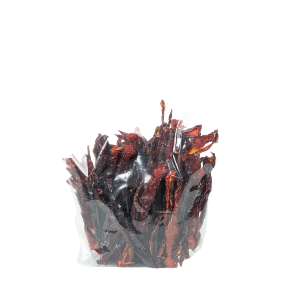 Dehydrated red bell pepper stirrers packaged for bar and culinary use
